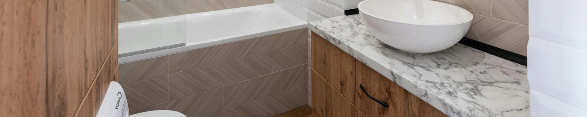 Marble vanity top in a modern bathroom by CarpetsPlus COLORTILE of Hutchinson